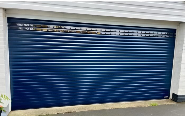Blue glazed sectional garage door